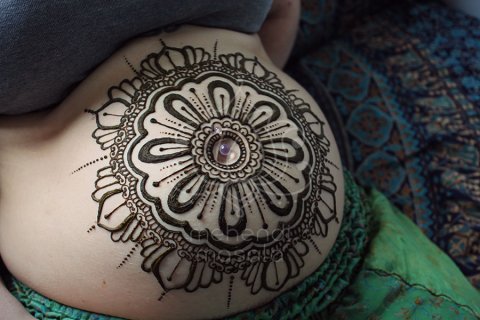 Tatuaże z henny wzory na brzuchu mandala